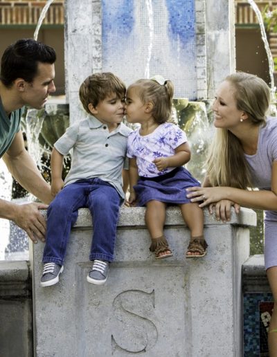 Melody's family toddlers kissing